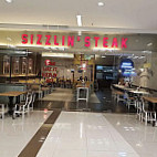 Sizzlin' Steak inside