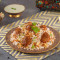 Hyderabadi Dum Gosht Pittige Schapenbiryani, Zonder Been Serveert 1-2]