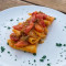 Paccheri Rigati Con Pomodorini, Crema Di Peperoni E Salsiccia